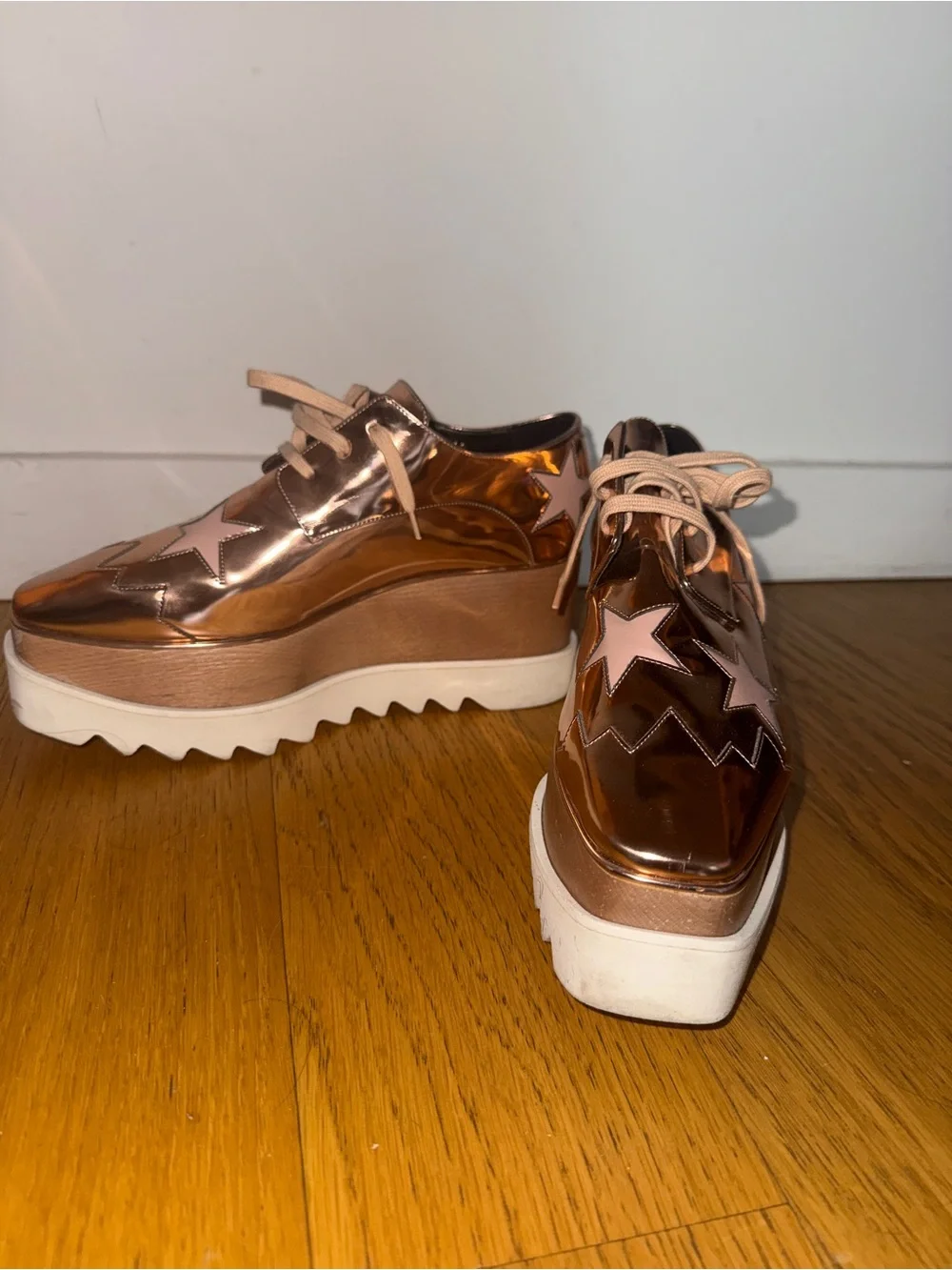 Stella McCartney Metallic Rose Gold Platform Lace-Up Sneakers with Pink Stars